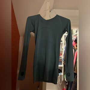 Size 4 Lululemon long sleeve swiftly tech In “water drop blue”
